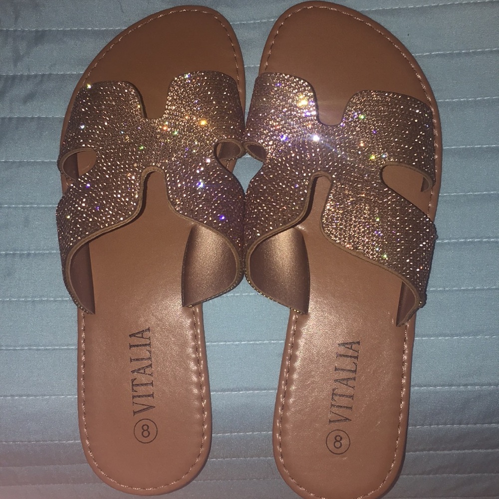 Bronze sequinned slide sandals.